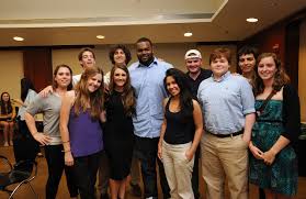 Sharing the power of cheerful giving' along with the support of her husband. Michael Oher Collins Tuohy Ocean Geo
