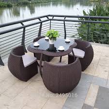 Ecopoly balcony table has a rounded table top and rounded lower shelf. 5 Pcs Outdoor Patio Furniture Chair Set Metal Frame Dining Table Set For Garden All Weather Rattan Wicker Dining Set Garden Furniture Sets Aliexpress