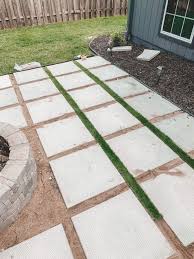1×4 or 2×4 i have been trying to build my own patio for two years. Diy Patio With Grass Between Pavers And A Fire Pit Diy Patio Pavers Diy Patio Backyard Landscaping Designs