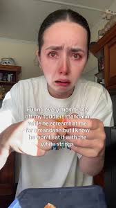 Student Remove Mandarin from Glass