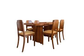 The table features a solid top, while the chairs have shaped seats. Art Deco Walnut Dining Table 6 Chairs 1920s For Sale At Pamono