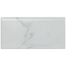 Offered in a durable, high gloss finish, bright tile coordinates with matte tile, Classico Carrara Glossy Bullnose 3 X6 Ceramic W Trim