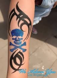 Glitter tattoos consists of applying your choice of glitters with body glue on your favourite stencil design. Los Angeles Glitter Tattoos We Adorn You