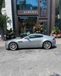 Image result for Lightning Silver 2008 Aston Martin