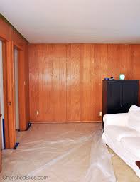 The existing dark wood paneling in. How To Paint Wood Paneling Cherished Bliss