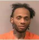 Man arrested for stealing, kicking officer