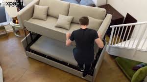 Luonto describes the elevate bunk bed sofa sleeper as a modern marvel of engineering. the bottom of the couch lifts up to reveal two mattresses, so you can the sofa also includes a ladder to the top bunk, with guardrails on the side of the mattress (so no one takes a tumble off the top). Dormire Sofa Bunk Bed Transformer Demonstration Youtube