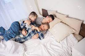 Check spelling or type a new query. The Family Morning In The Bedroom On The Bed Mom Dad Son Stock Photo Picture And Royalty Free Image Image 113719654