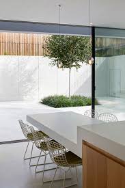 19 Dining Spaces You D Be Proud To Have In Your Home Vogue Living Dining Table In Kitchen Kitchen Island Dining Table Kitchen Island Bench