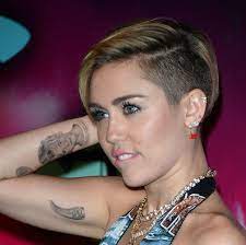 From tattoos roused by miley's family and companions, to her solid religious convictions and her support of peace, love and fairness. Miley Cyrus Just Got A New Tattoo In Honor Of Liam Hemsworth Glamour