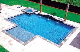 Small pools come in all shapes (and sizes), and are best when designed to fit snugly, complementing the space. Modified Rectangular Swimming Pool Pictures Blue Haven Pools Rectangular Swimming Pools Pools Backyard Inground Backyard Pool Designs