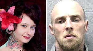 Man, 34, charged in stabbing death of Elgin woman