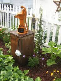 Door is decorative and does not open. 32 Well Pump Covers Ideas Well Pump Well Pump Cover Backyard
