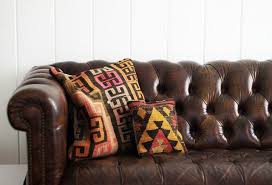 If going hog wild with leather pieces isn't how you roll, consider accessories, ottomans and handles for just the right dose of. Best Throw Pillows For Brown Couches Infinite Sushi