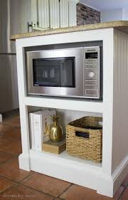 Our Kitchen Island With Microwave We Added A Built In Shelf Driven By Decor Kitchen Booths Built In Microwave Cabinet Kitchen Remodeling Projects