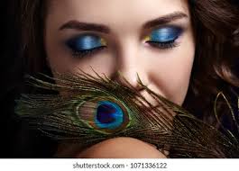 6+ Thousand Fashion Woman Peacock Royalty-Free Images, Stock Photos &  Pictures