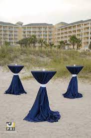 Highboy Cocktail Tables With Blue Linens And Candles On The Beautiful Amelia Island In Front Of The Omni Hotel Cocktail Table Decor Cocktail Tables Event