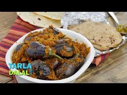 The Bharwan Baingan Also Called Bharwa Baingan Is A Super Tasty Dish Of Small Brinjals Prepared The Punjabi Way Recipes Tasty Dishes Indian Cooking Videos