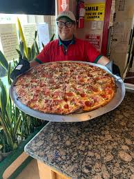 Click the calculate button to get the number of pizzas you'll need to order. Extreme Foods Bet You Can T Eat More Than 2 Slices Of This Pizza From Houston S Original Fuzzy S Pizza