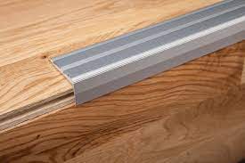 Add the perfect finish to your shaw laminate flooring. Inspiring Edging And Trim Using Schluter Strip Ideas Edging Laminate Flooring Using Schluter Strip Ideas Stair Nosing Laminate Flooring Stairs