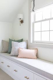built in window bench seat with white painted drawers and gold hardware neutral sunbrella bench living room bench bedroom seating home office furniture design
