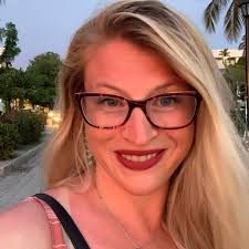 Sweet puppy Sunny plays a game of Hide-n-Seek from her Weenie Warmer 🥰