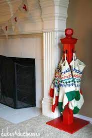 Maybe you would like to learn more about one of these? Stocking Stand Using A Wooden Stair Rail And Hooks Christmas Decor Diy Christmas Stockings Diy Christmas Wood Crafts
