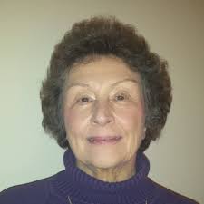 Christmas tradition: Mountain laurel rope with lights outside homes