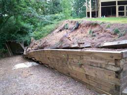 The best kind of lumber for these walls is douglas fir pressure treated with preservatives to discourage rot. Small Yards Made Big With Retaining Walls