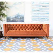 It's made with a solid wood frame, and is upholstered in a polyester velvet fabric. Mid Century Modern Clodine Orange Velvet Sofa Ash2689