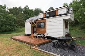 White siding black metal roof. Photo 1 Of 9 In This Magical Dwelling Can Make Your Tiny House Dreams Come True Dwell