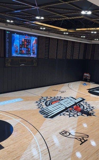 The regulation indoor NBA basketball court dubbed The Sanctuary, AI generated