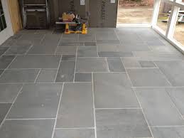This can often mean extreme heat, rain, snow, or all of these. Bluestone Beadboard Screened Porch Sapia Builders Porch Tile Stone Tile Flooring Patio Flooring
