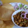 It is a combination of chana masala (spicy white chickpeas) and bhatura/puri, a fried bread made from maida. Https Encrypted Tbn0 Gstatic Com Images Q Tbn And9gctztj8vuogkqsfkxp1vjnta8gapfacrimgwxeb8rbm Usqp Cau