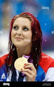 Jessica-Jane Applegate of Great Britain celebrates with her gold medal  after winning the women's 200m Freestyle