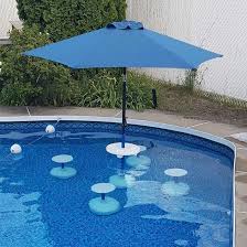 Relaxation Station Swimming Pool Table And Stools Aughog Products Beach Umbrella Sand Anchors Sandbar Anchors And More In 2020 Pool Shade Pool Umbrellas Pool Lounge