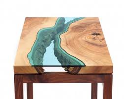 Whether you are looking for a reclaimed wood coffee table as a conversation piece for your living room or reclaimed wood desks for your office, you can find a nice selection. River Archives Greg Klassen Furniture Reclaimed Wood Table Handcrafted Table Wood Table