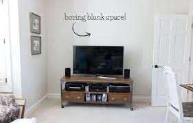 Installing a shelf (or several) significantly improves the storage situation in any bathroom, even those notoriously cramped city apartments. Adding A Shelf Above The Tv A Simple Decorating Solution Driven By Decor Wall Decor Above Tv Decor Above Tv Decor Around Tv