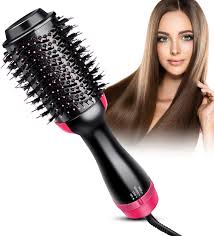 This tiny hot air brush packs a punch with a ton of features that leaves your hair looking gorgeous in minutes. Best Hot Air Brush For Curly Hair