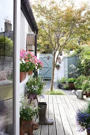 A London Home Filled With Travel Finds Design Sponge Small Space Gardening Cottage Garden Budget Backyard