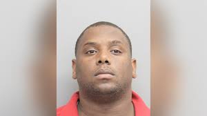 Man hides drugs in infant formula can, gun in diaper dispenser, police say 