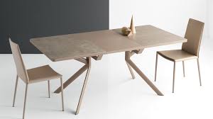 Metal central base with four legs with elliptical section and folding mechanism with central extension that matches the base. Giove 4739 R Extendable Table By Connubia By Calligaris In Dining Tables