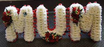 Funeral flower arrangements funeral flowers memorial flowers sympathy flowers casket red and white christmas wreaths centerpieces church decorations. Mum Red And White Buy Online Or Call 01206 843461