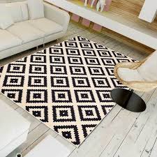 Salon minimaliste avec tapis gris. Un Amour De Tapis Petit Tapis Entree Interieur Tapis Salon Moderne Design Scandinave Berbere Geometrique Tapis Noir Creme 60x110 Cm Tapis Salon Tapis Moderne Tapis