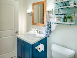 One way to improve the look and usefulness of a bathroom is to invest in a useful vanity. Bathroom Update Add A Frame To A Mirror And Paint A Vanity Hgtv