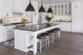 By fifth and main lighting (29. White Kitchen With Dark Hickory Wood Floors Kitchen With Black Pendant Lights Over White Kitchen Islan White Kitchen Design Kitchen Countertops Kitchen Design