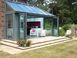 Ganzjahres Wintergarten Mit Glas Faltwanden Fenster Schmidinger In 2020 Wintergarten Dachterrasse Wintergarten Terrassenuberdachung