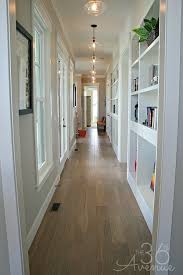 25 Creative Ways To Bring Style To Your Hallway Hallway Designs House Hall Design Narrow Hallway Decorating