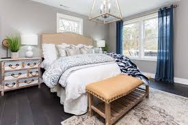 The terms master suite and master bedroom are used frequently in the design world. See A Boring Split Level House Transform Into A Chic Coastal Retreat