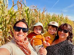 Pumpkin patch beside the cornfields in Longmont, Colorado with my grandsons  daughter Grace #grandparenting #pumpkins #longmontcolorado #autumn